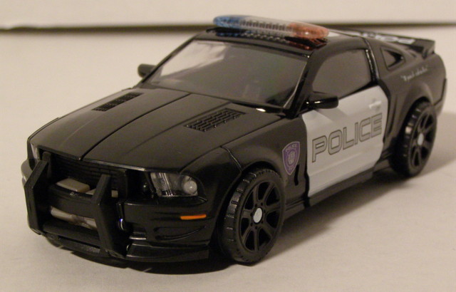 Barricade's alt mode is a 2007 Saleen Mustang S281 guised as a police 