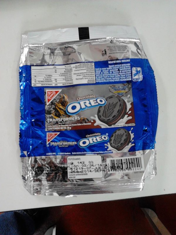 More Info on South American Transformers Age of Extinction Oreo Promo- Reverse Side of Poster, Packaging